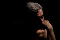 Fine art photograph of a man intimade focused on light, composition, and a moment of stillness.